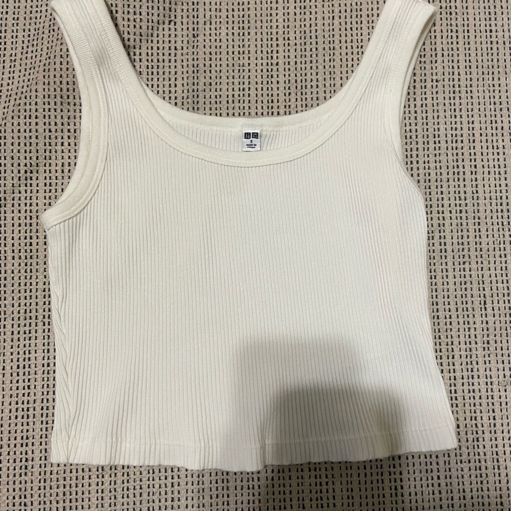 white ripped tank top